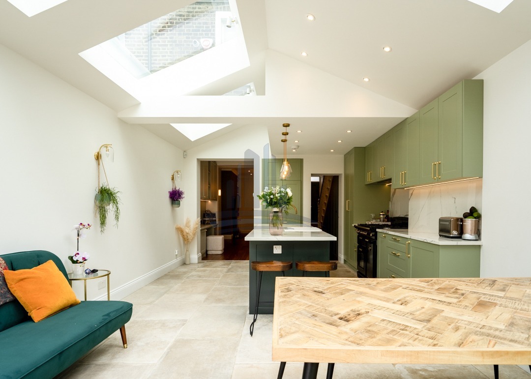 luxury open spaced kitchen with living room made in the attic after attic conversion London